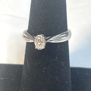 Moissanite ring .43 ct oval solitaire. 14k WG